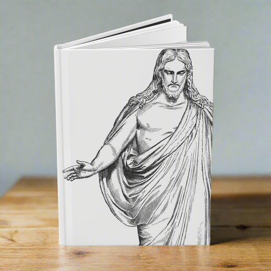 A hardcover blank notebook with a white cover, featuring a black and white etching of Jesus Christ by Thorvaldsen.