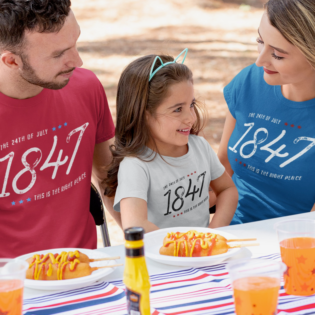 LDS family wearing matching Pioneer Day shirts from Nauvoo Supply